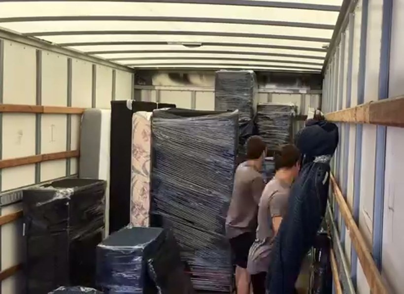 Everyday Movers crew handling a piece on a Worcester job