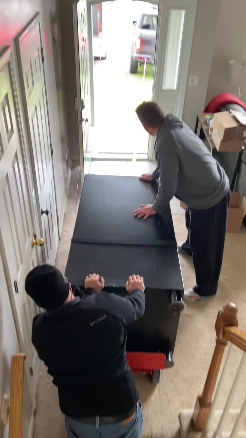 Everyday Movers crew handling a piece on a Worcester job