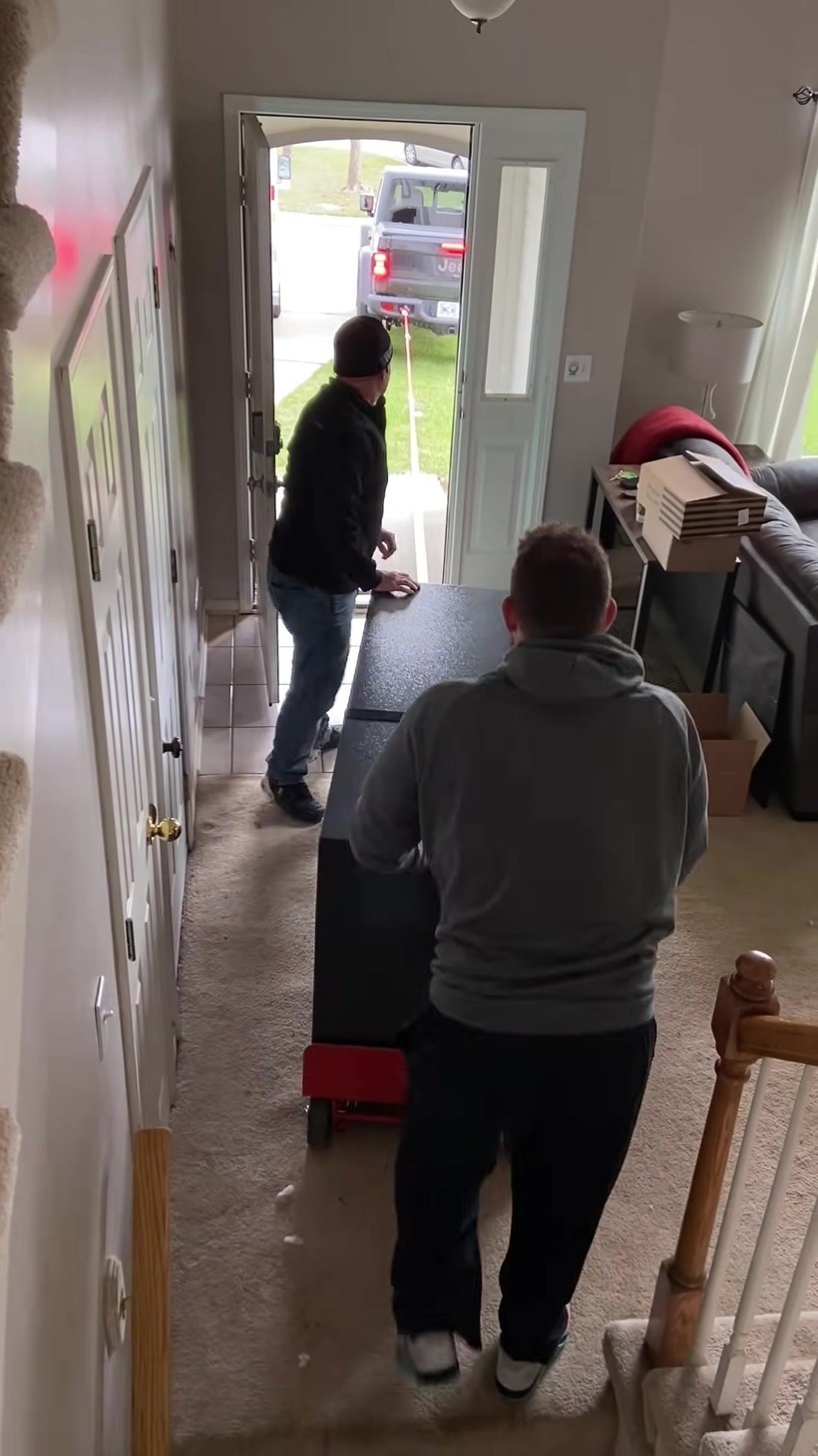 Everyday Movers crew handling a piece on a Worcester job